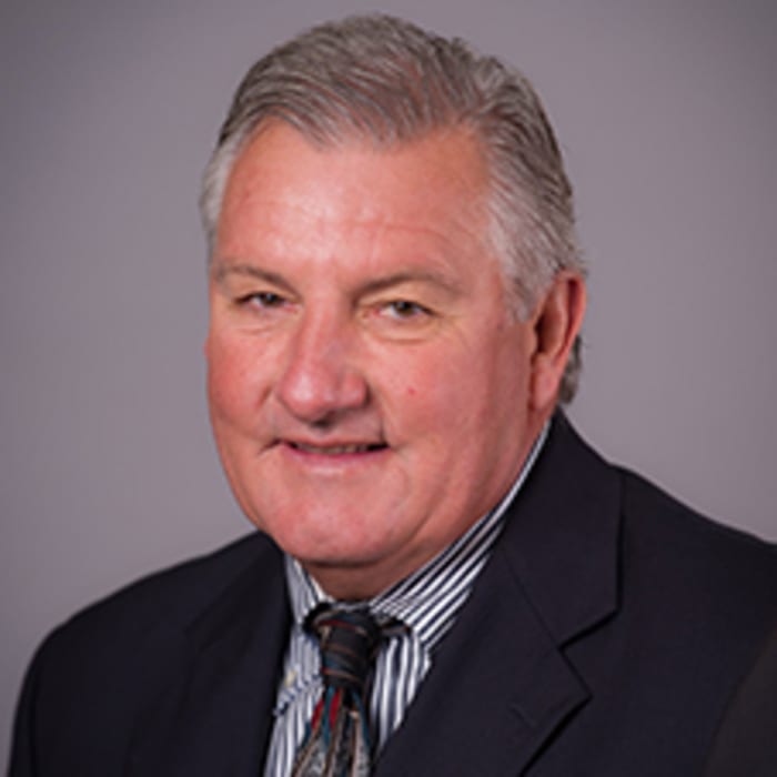 Bobby Allen was a longtime University of Arkansas staff member and saw two sons play QB for the Razorbacks. (Photo courtesy of the University of Arkansas Sports Information.)